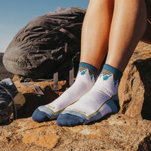 Darn Tough Women's Hiker Quarter Midweight Hiking Sock in Mountain White - on the trail