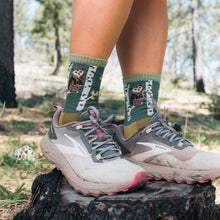 Darn Tough Women's Critter Club Micro Crew Lightweight Hiking Sock in Owl Green on the trail